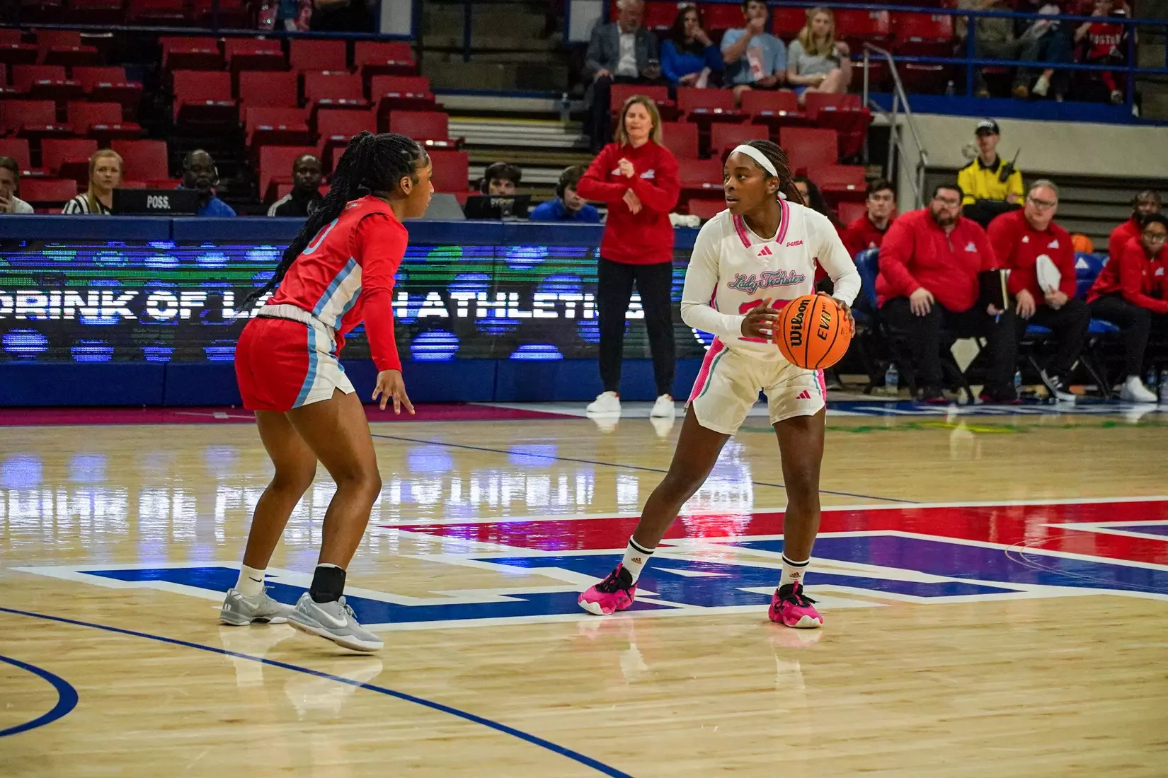 LA Tech erases 10-point 4th quarter deficit to beat Liberty 67-66