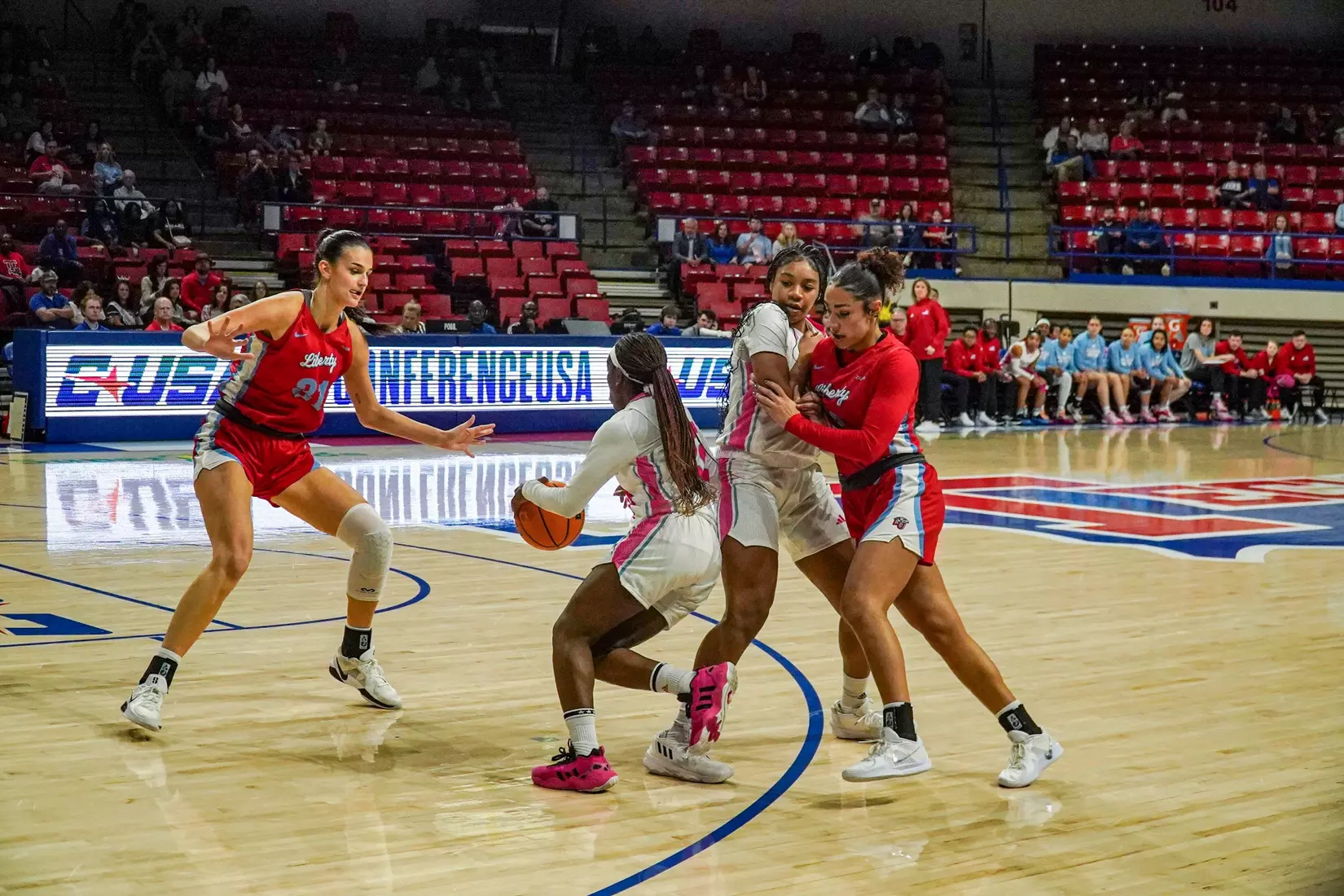 LA Tech erases 10-point 4th quarter deficit to beat Liberty 67-66