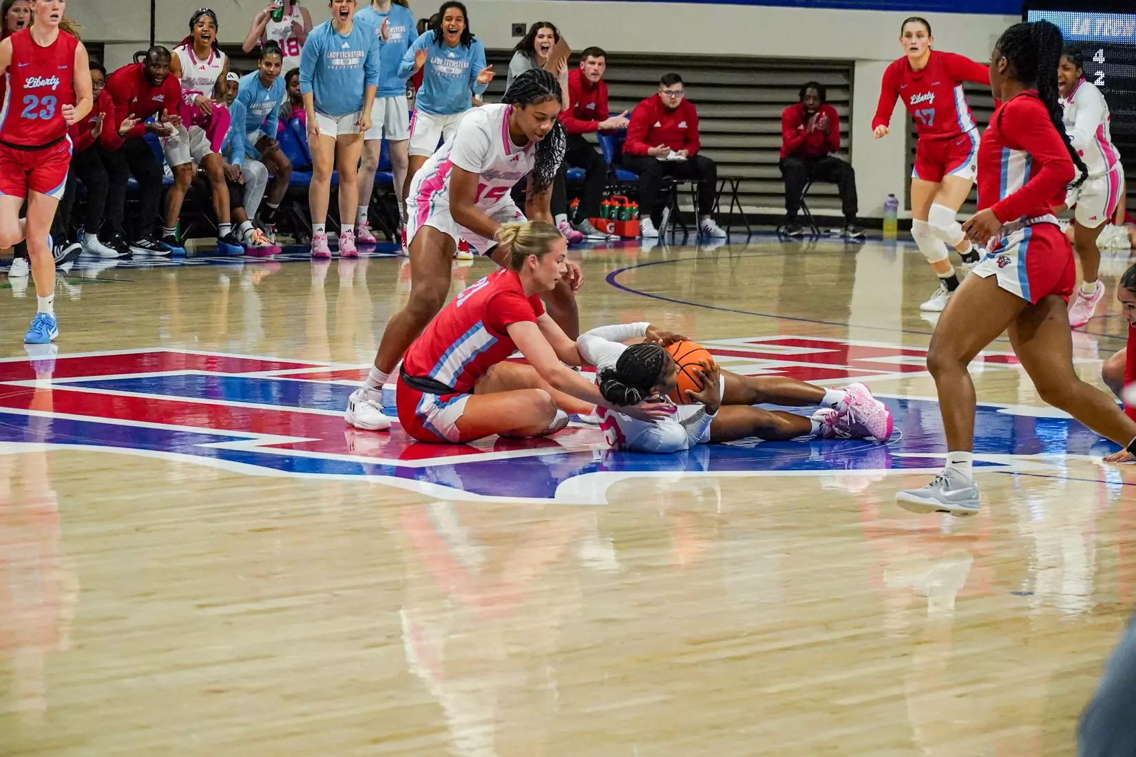 LA Tech erases 10-point 4th quarter deficit to beat Liberty 67-66