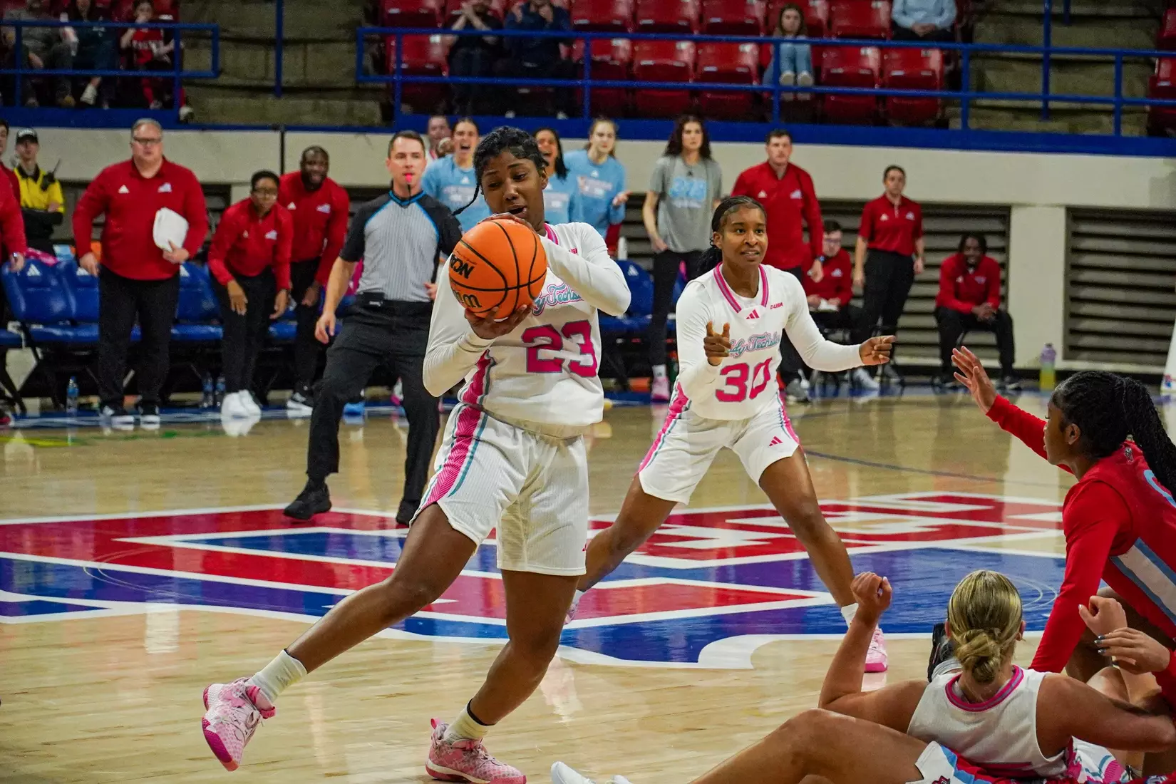 LA Tech erases 10-point 4th quarter deficit to beat Liberty 67-66
