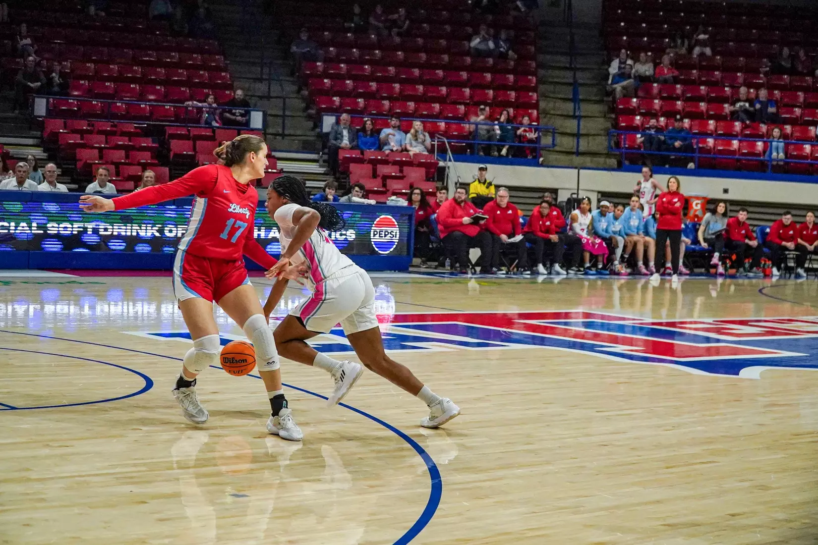LA Tech erases 10-point 4th quarter deficit to beat Liberty 67-66