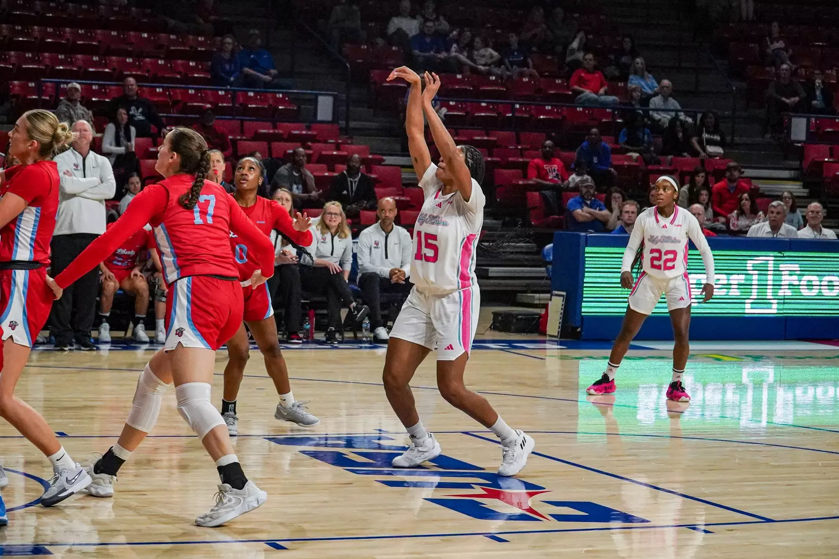 LA Tech erases 10-point 4th quarter deficit to beat Liberty 67-66