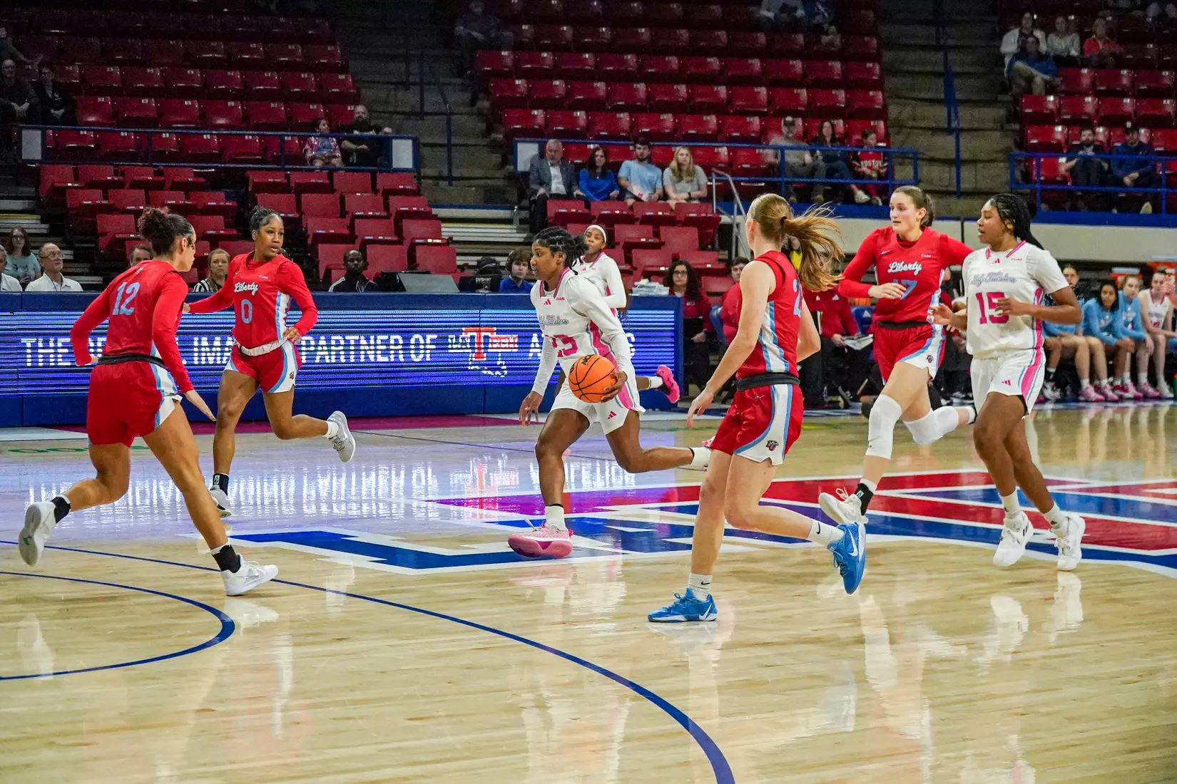 LA Tech erases 10-point 4th quarter deficit to beat Liberty 67-66