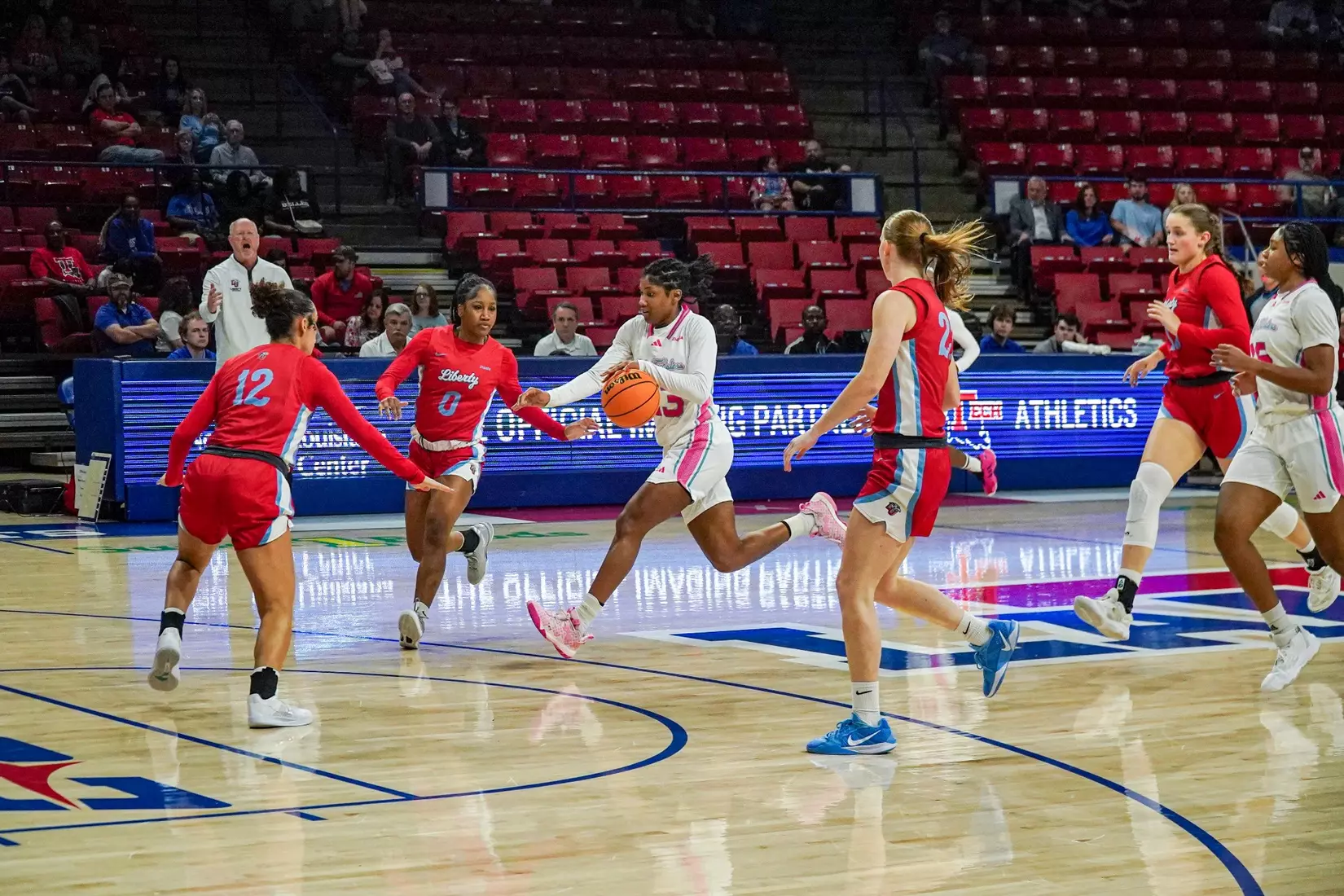 LA Tech erases 10-point 4th quarter deficit to beat Liberty 67-66