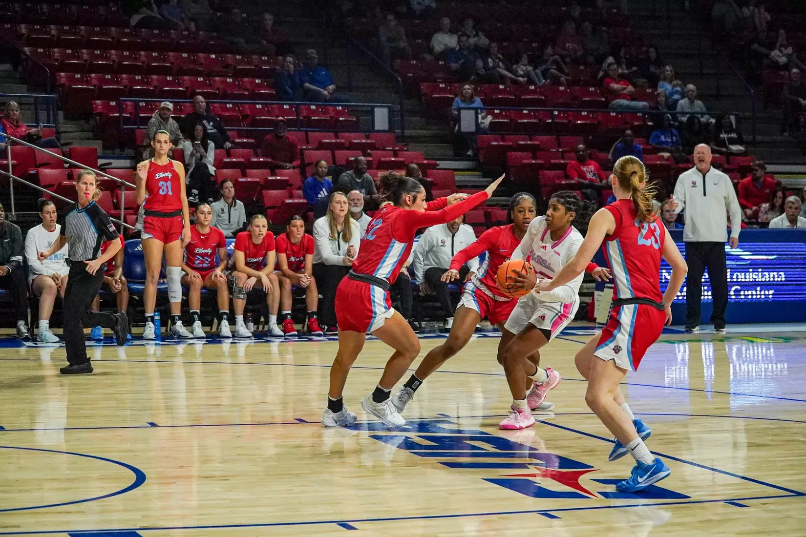 LA Tech erases 10-point 4th quarter deficit to beat Liberty 67-66