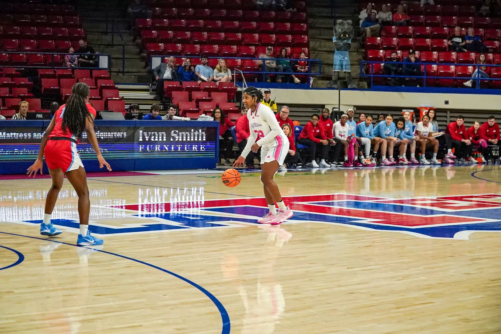 LA Tech erases 10-point 4th quarter deficit to beat Liberty 67-66