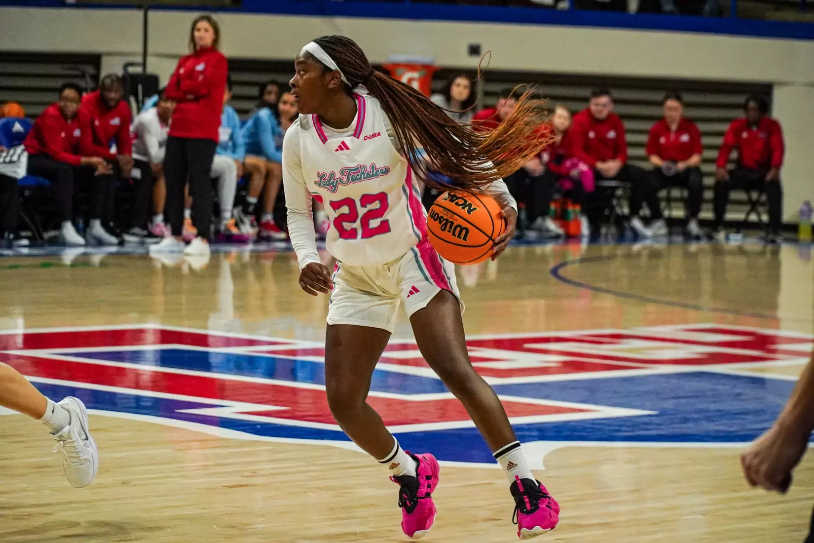 LA Tech erases 10-point 4th quarter deficit to beat Liberty 67-66