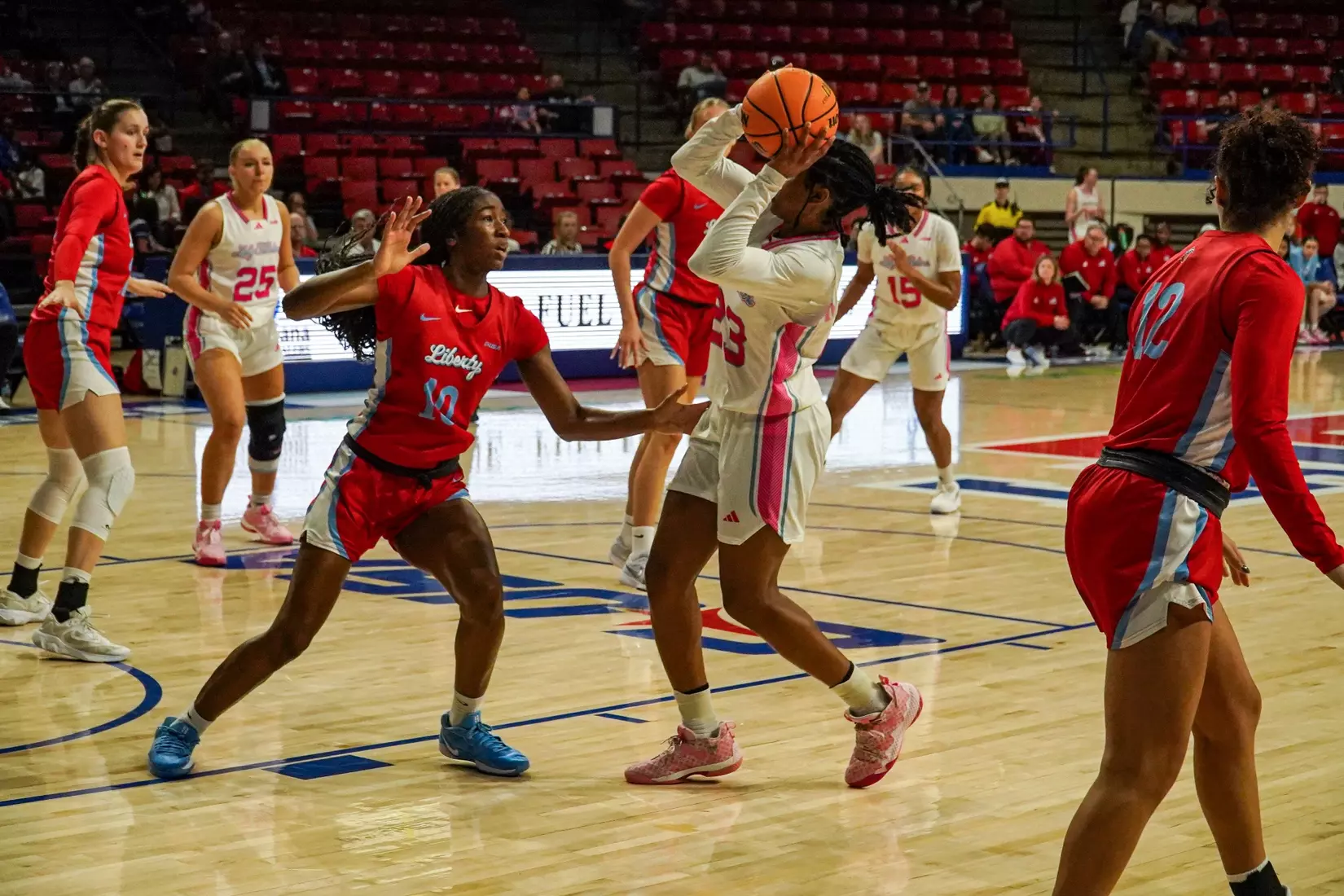 LA Tech erases 10-point 4th quarter deficit to beat Liberty 67-66