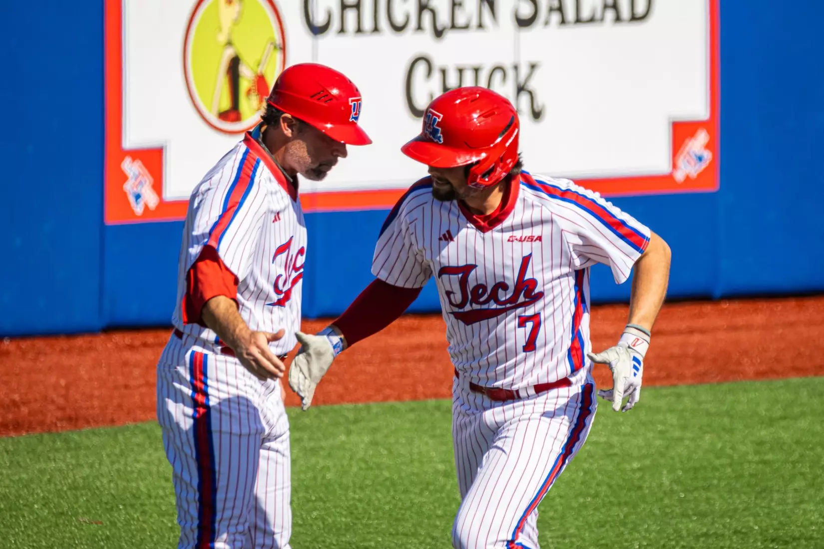 Bulldogs hit three homers in 11-4 victory over Tigers
