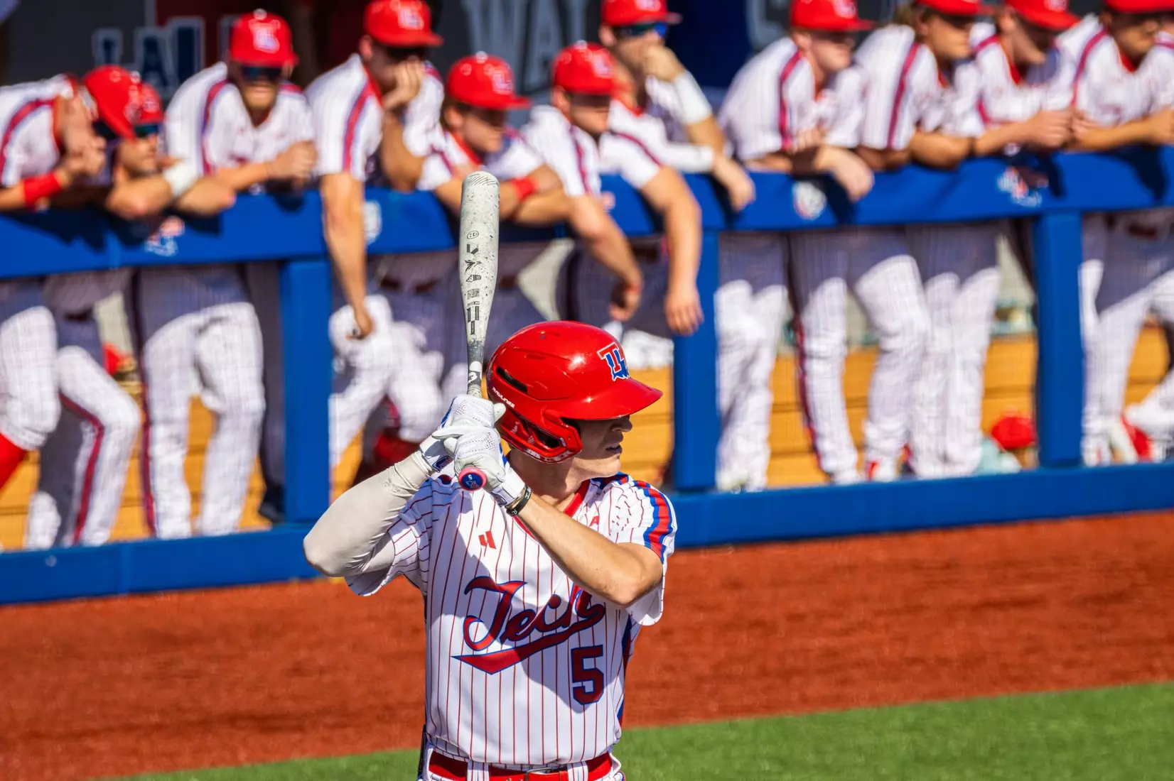 Bulldogs hit three homers in 11-4 victory over Tigers