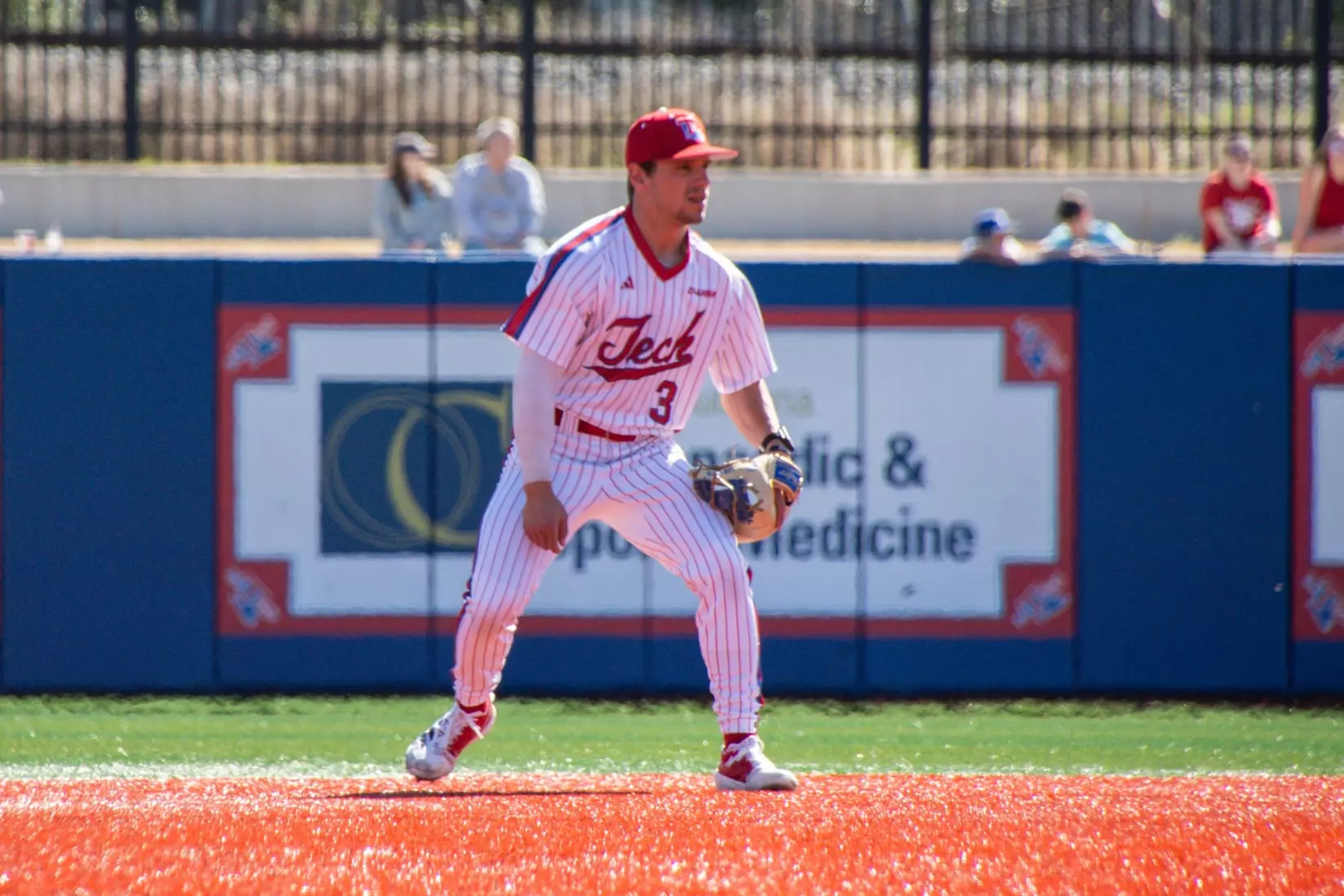 Bulldogs hit three homers in 11-4 victory over Tigers