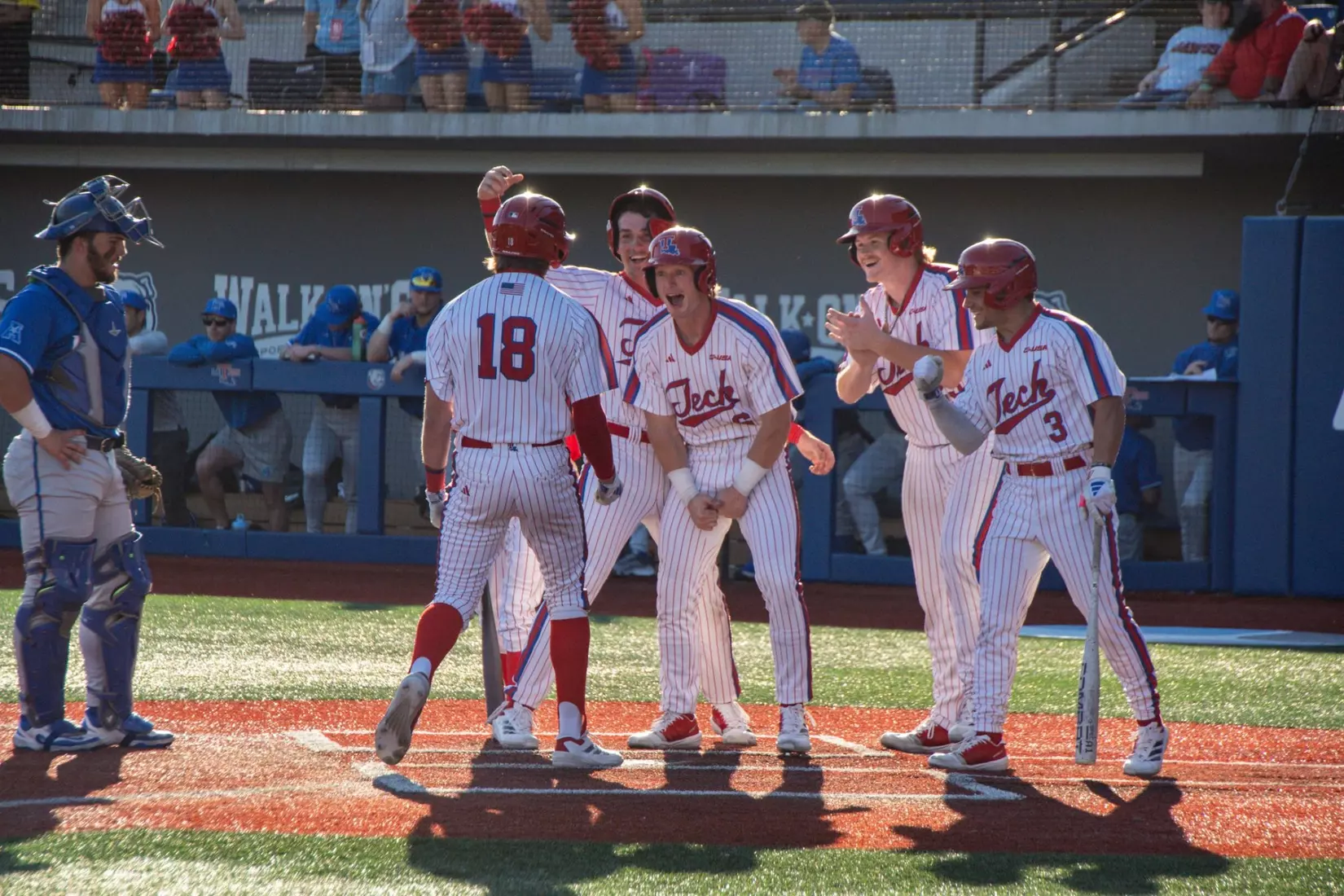 Bulldogs hit three homers in 11-4 victory over Tigers