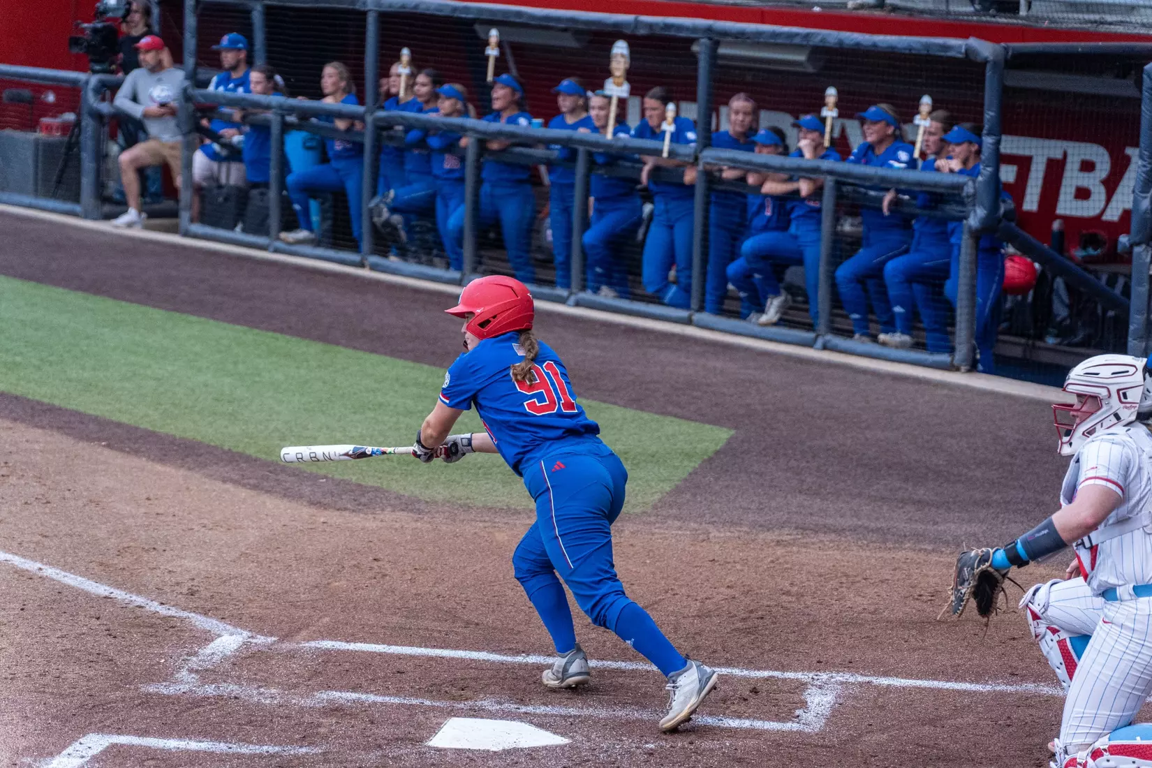 LA Tech defeats Liberty 7-2 in extra innings.
