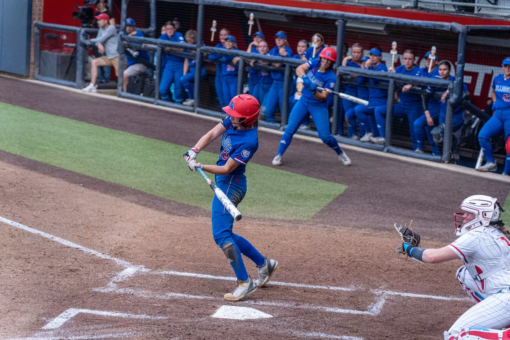 LA Tech defeats Liberty 7-2 in extra innings.