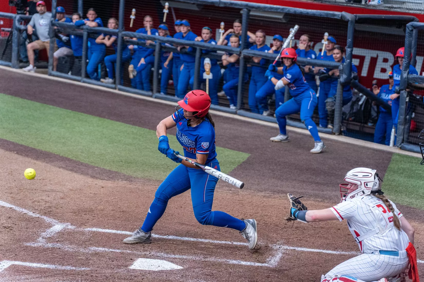 LA Tech defeats Liberty 7-2 in extra innings.