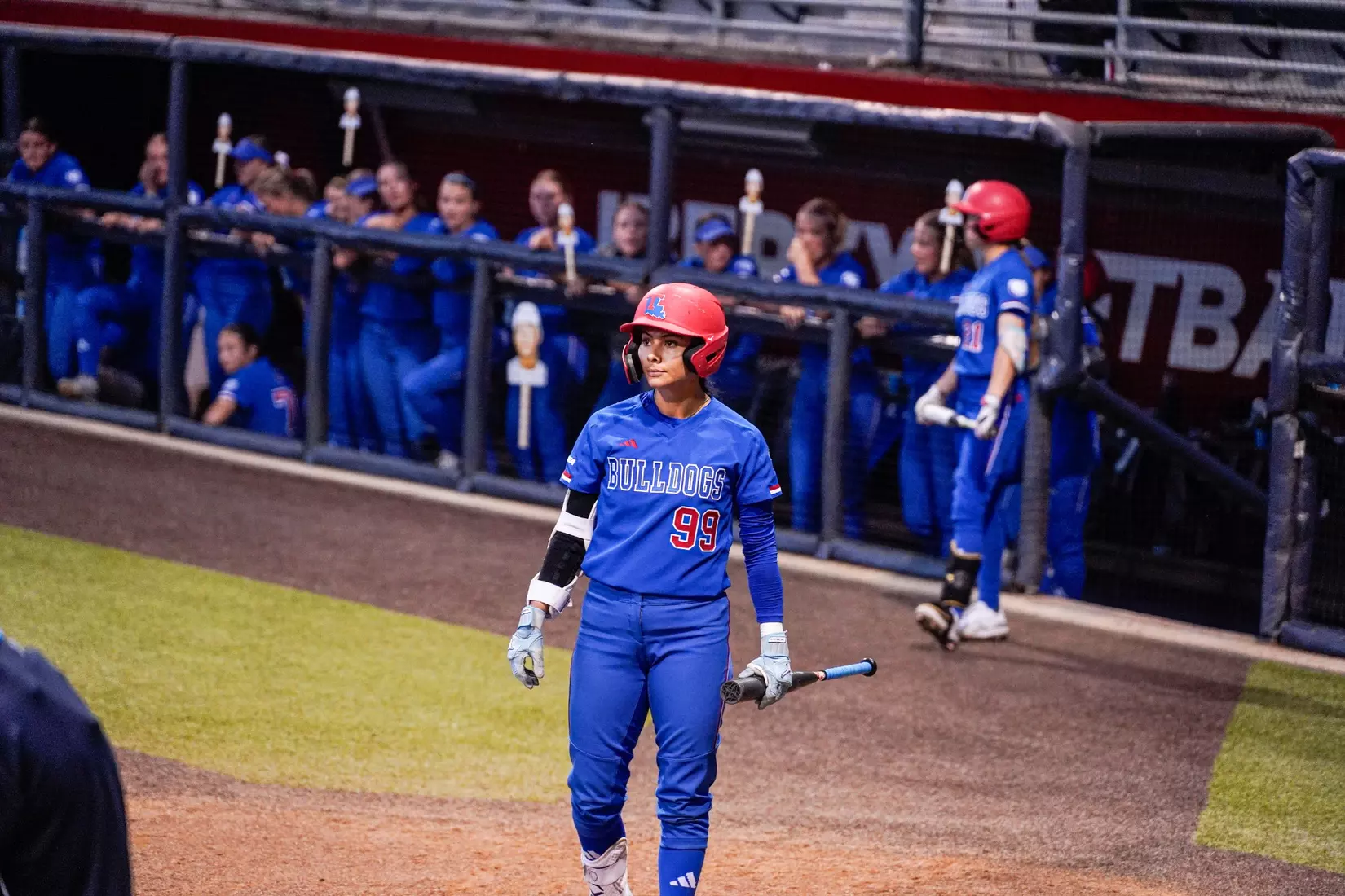 LA Tech defeats Liberty 7-2 in extra innings.