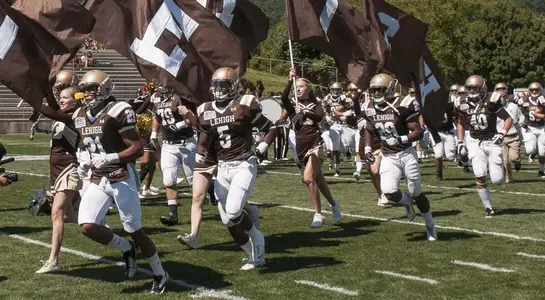FB Team Running Out CCSU 13