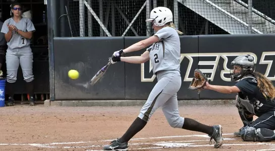 Emily Bausher hitting 586