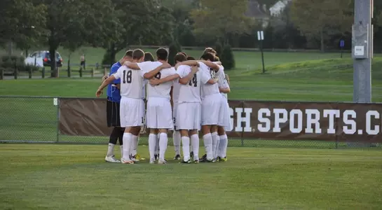 Men's Soccer Team Huddle