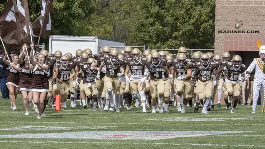 Football Team Running Out Marines