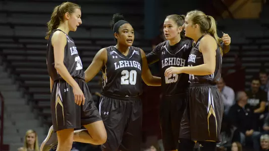 Team Huddle Group Mann at Minnesota