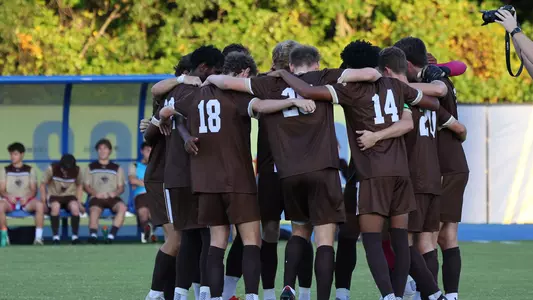 Men's soccer huddle
