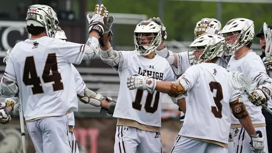 Men's lacrosse huddle