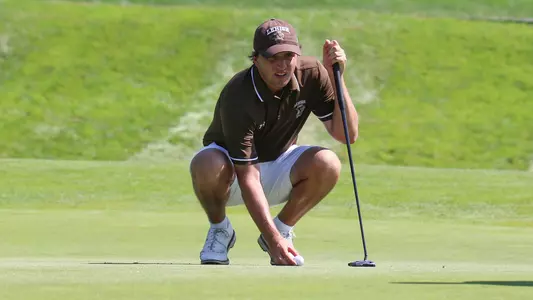 Edmund Broderick lining up putt