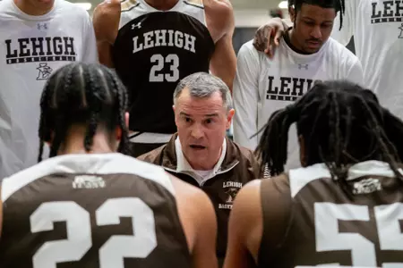 Brett Reed huddle at American