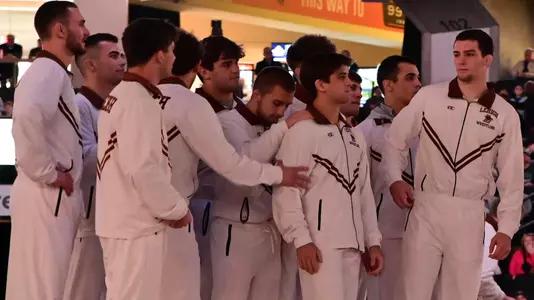 Team huddle vs Penn State
