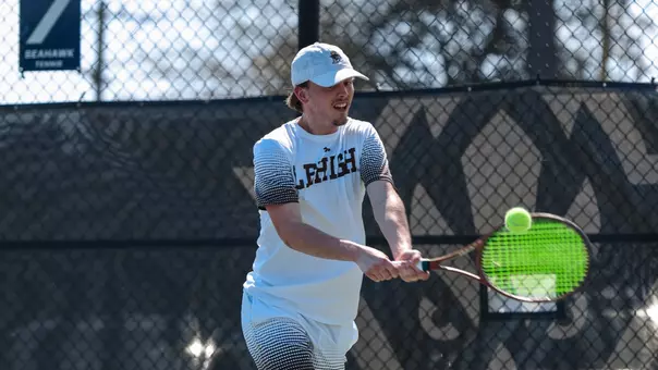 men tennis action shot