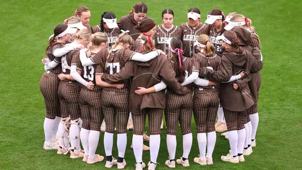 Softball team huddle NC State