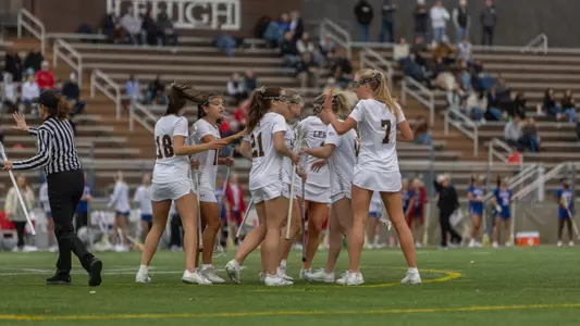 Team huddle vs American