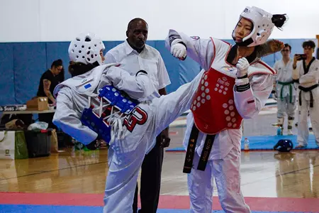 Liberty-womens-taekwondo-woman-roundhouse