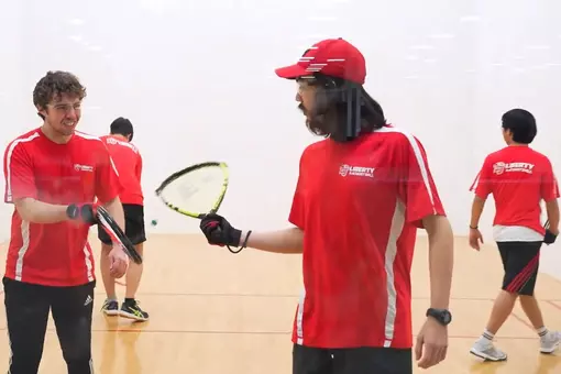 Luke-Hagberg-Andrew-Cook-racquet-tap