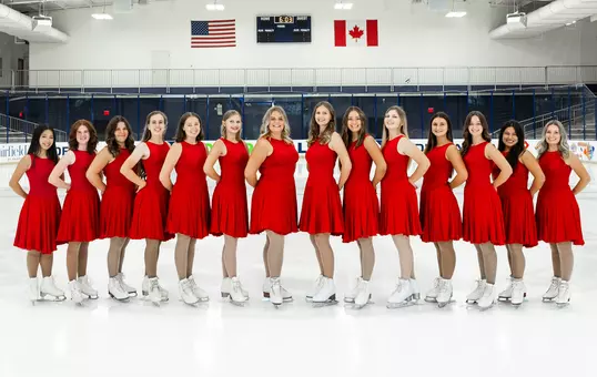 Synchro skating team in red