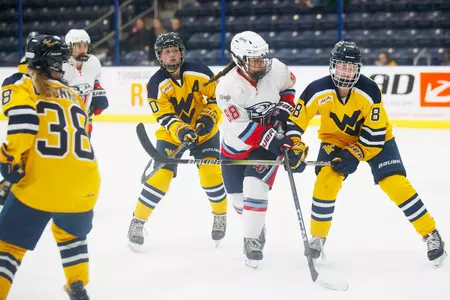 Abby Rogers battles WVU players