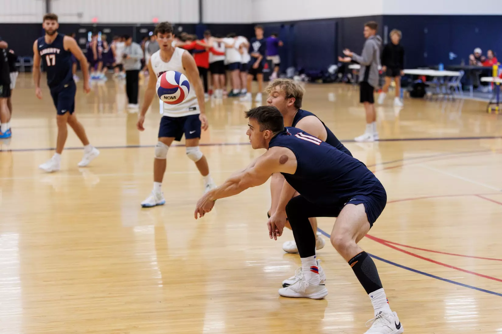 The Liberty Men’s Indoor Volleyball team faces the University of Virginia at the Preseason ECVF Tournament in the Lahaye Multipurpose Center on October 18th, 2025. (Photo by Grace Greer)