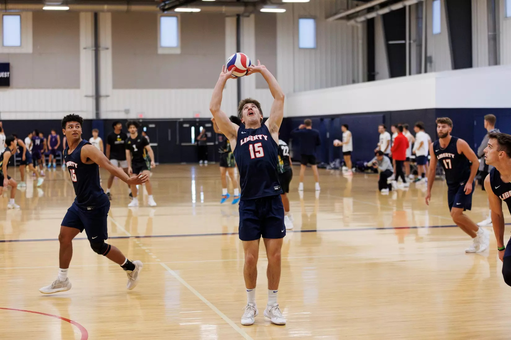 The Liberty Men’s Indoor Volleyball team faces the University of Virginia at the Preseason ECVF Tournament in the Lahaye Multipurpose Center on October 18th, 2025. (Photo by Grace Greer)