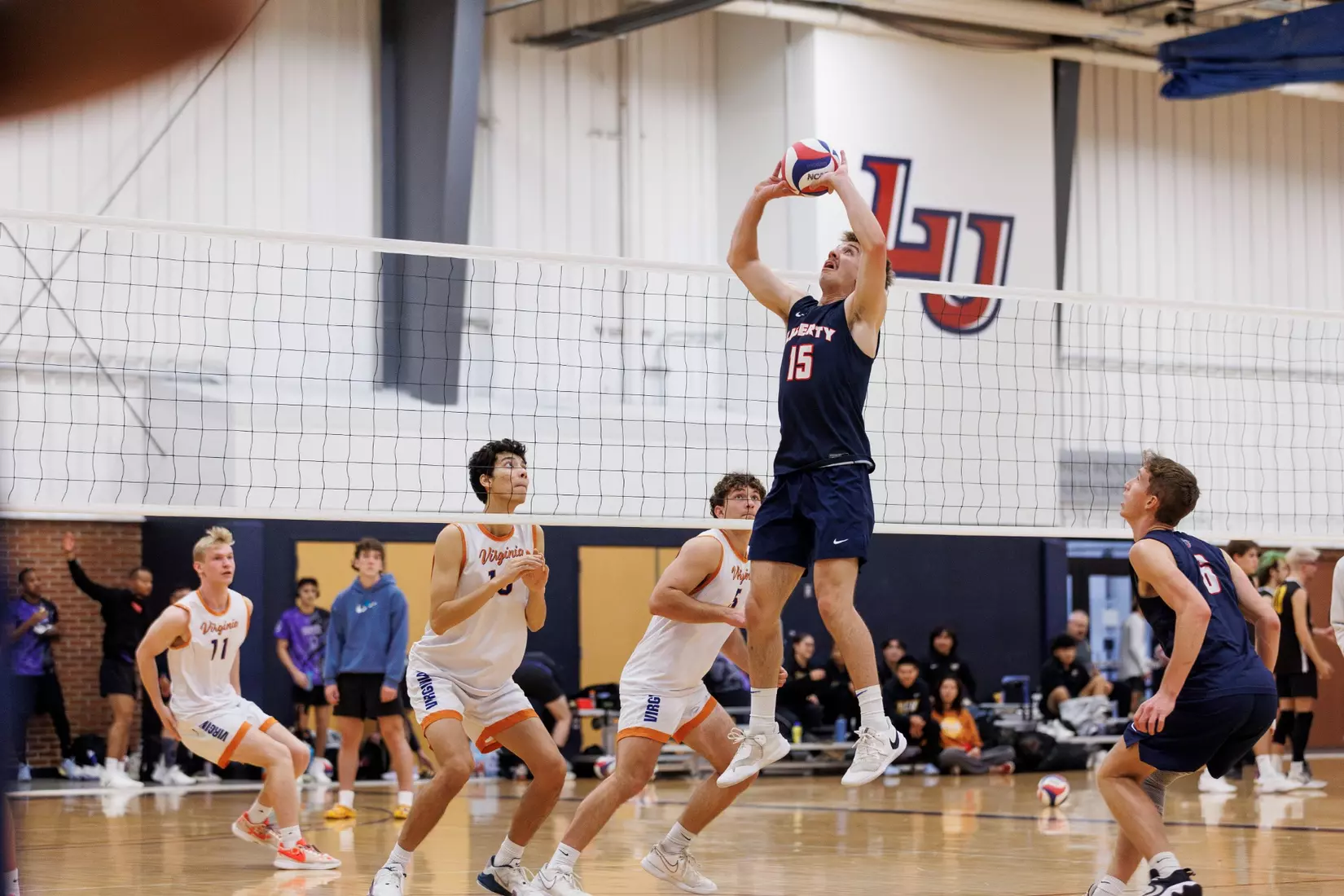 The Liberty Men’s Indoor Volleyball team faces the University of Virginia at the Preseason ECVF Tournament in the Lahaye Multipurpose Center on October 18th, 2025. (Photo by Grace Greer)