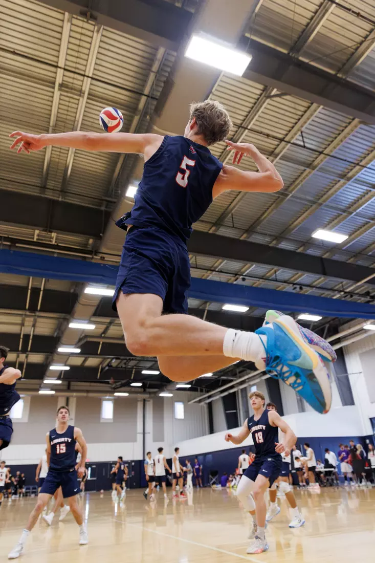 The Liberty Men’s Indoor Volleyball team faces an LU Alumni team at the Preseason ECVF Tournament in the Lahaye Multipurpose Center on October 18th, 2025. (Photo by Grace Greer)