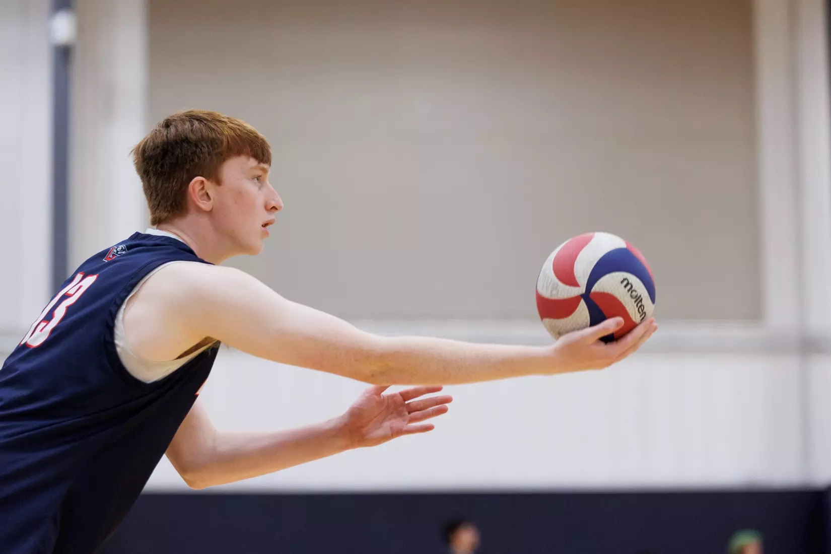 The Liberty Men’s Indoor Volleyball team faces an LU Alumni team at the Preseason ECVF Tournament in the Lahaye Multipurpose Center on October 18th, 2025. (Photo by Grace Greer)