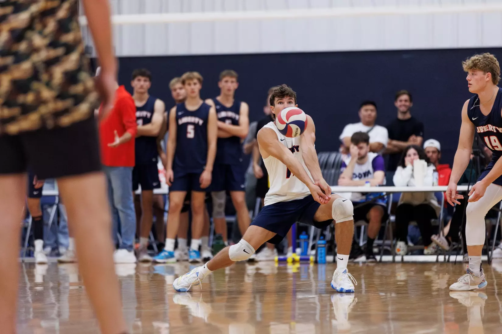 The Liberty Men’s Indoor Volleyball team faces an LU Alumni team at the Preseason ECVF Tournament in the Lahaye Multipurpose Center on October 18th, 2025. (Photo by Grace Greer)