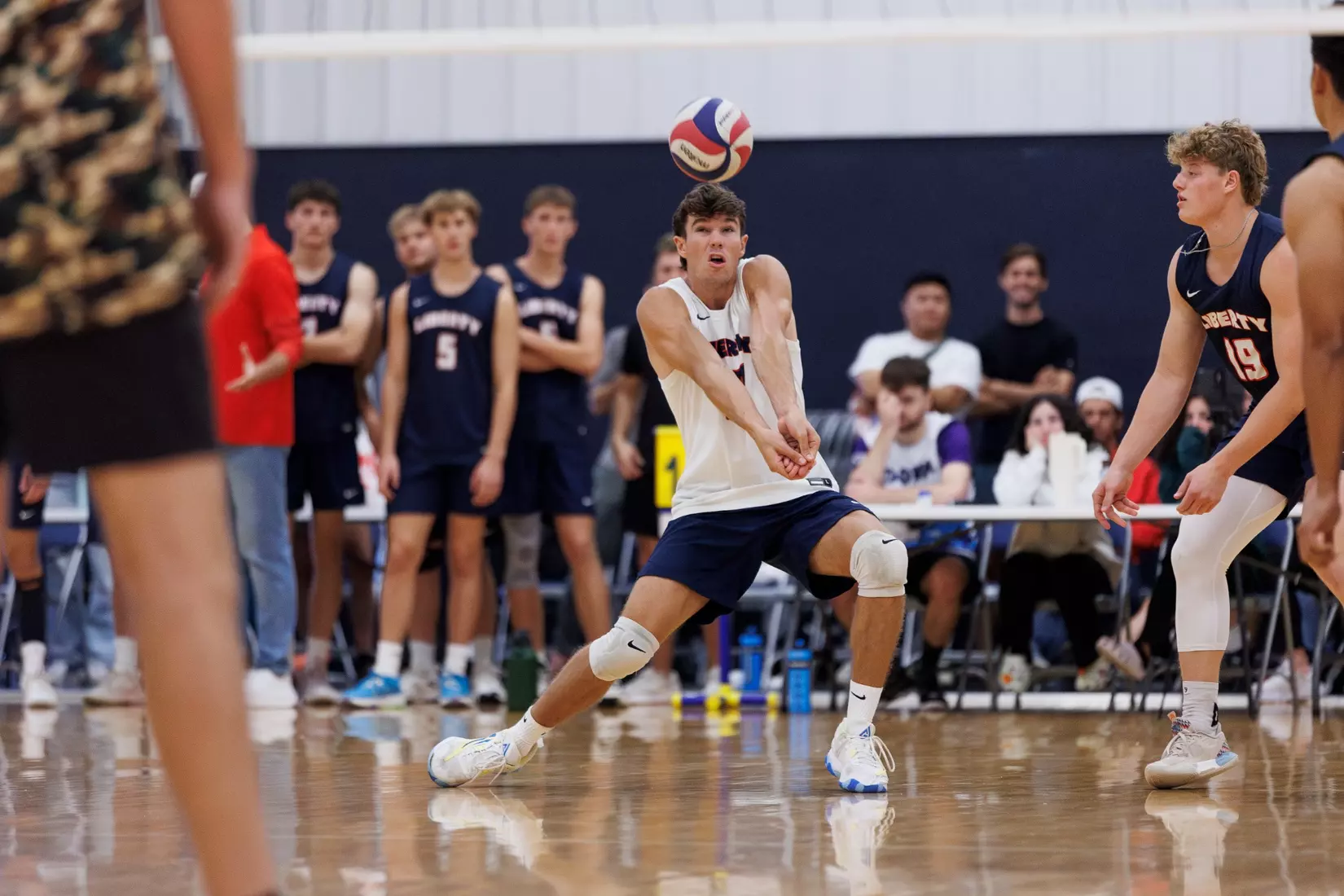 The Liberty Men’s Indoor Volleyball team faces an LU Alumni team at the Preseason ECVF Tournament in the Lahaye Multipurpose Center on October 18th, 2025. (Photo by Grace Greer)