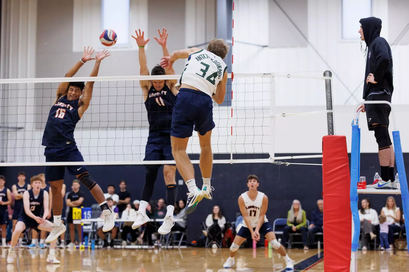 The Liberty Men’s Indoor Volleyball team faces an LU Alumni team at the Preseason ECVF Tournament in the Lahaye Multipurpose Center on October 18th, 2025. (Photo by Grace Greer)