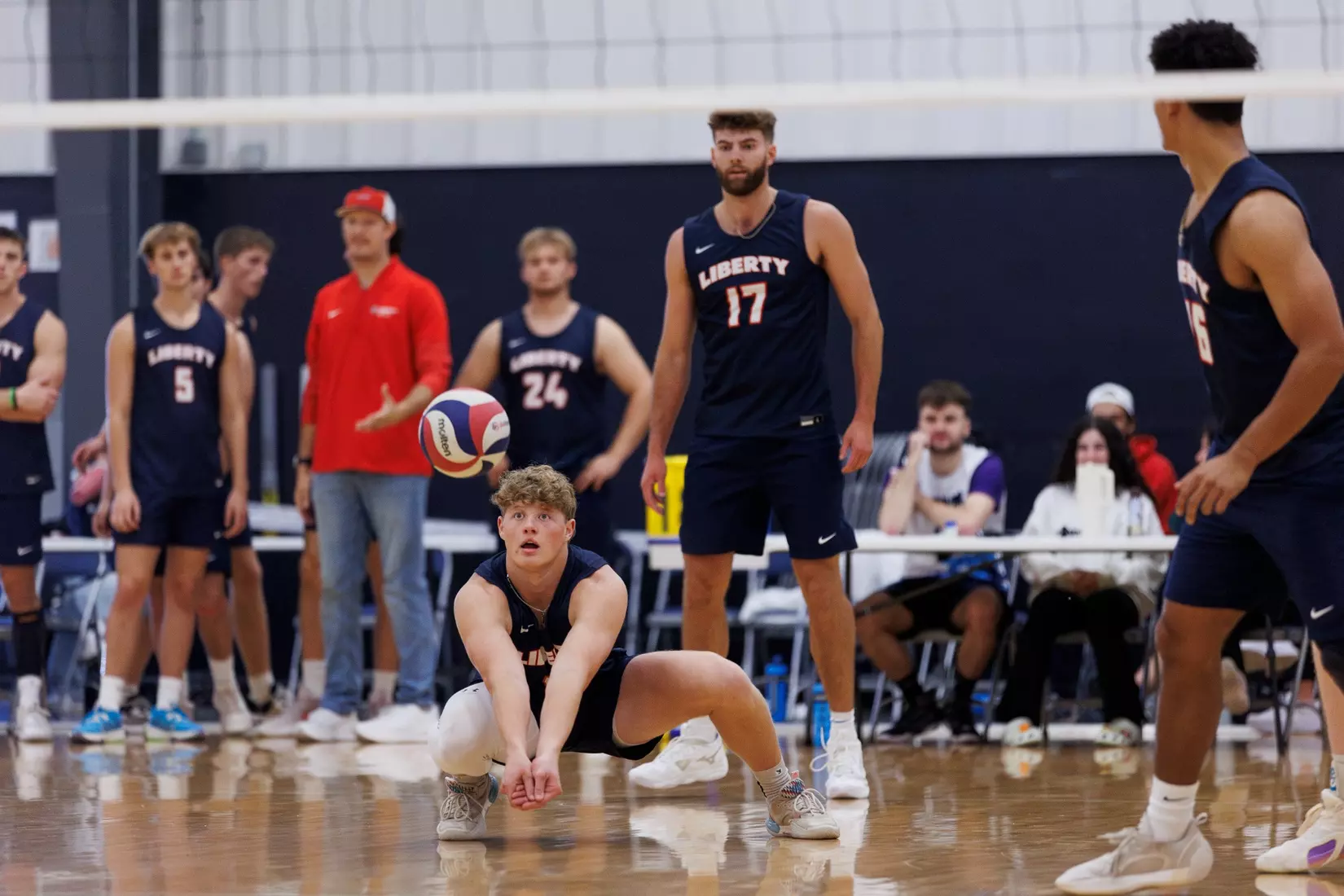 The Liberty Men’s Indoor Volleyball team faces an LU Alumni team at the Preseason ECVF Tournament in the Lahaye Multipurpose Center on October 18th, 2025. (Photo by Grace Greer)