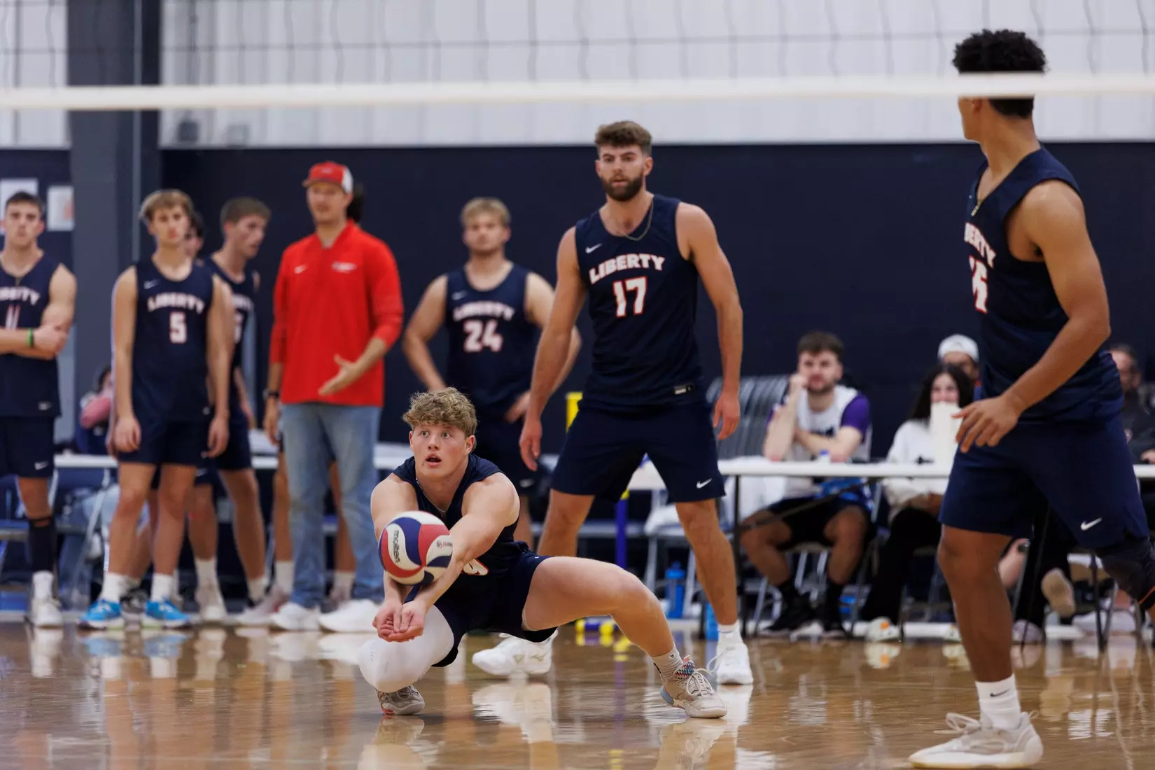 The Liberty Men’s Indoor Volleyball team faces an LU Alumni team at the Preseason ECVF Tournament in the Lahaye Multipurpose Center on October 18th, 2025. (Photo by Grace Greer)