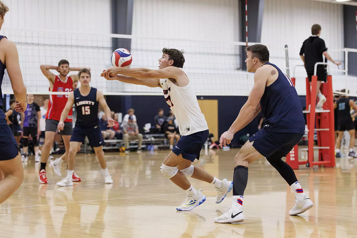 The Liberty Men’s Indoor Volleyball team faces an LU Alumni team at the Preseason ECVF Tournament in the Lahaye Multipurpose Center on October 18th, 2025. (Photo by Grace Greer)