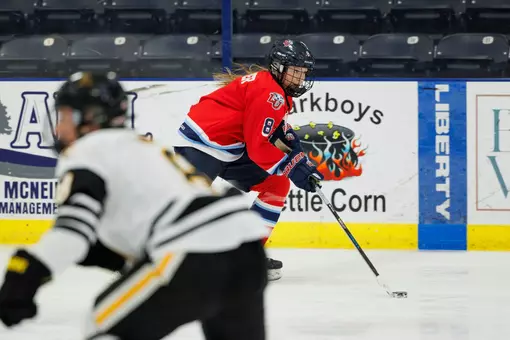 Ellie Sarauer skates past Adrian