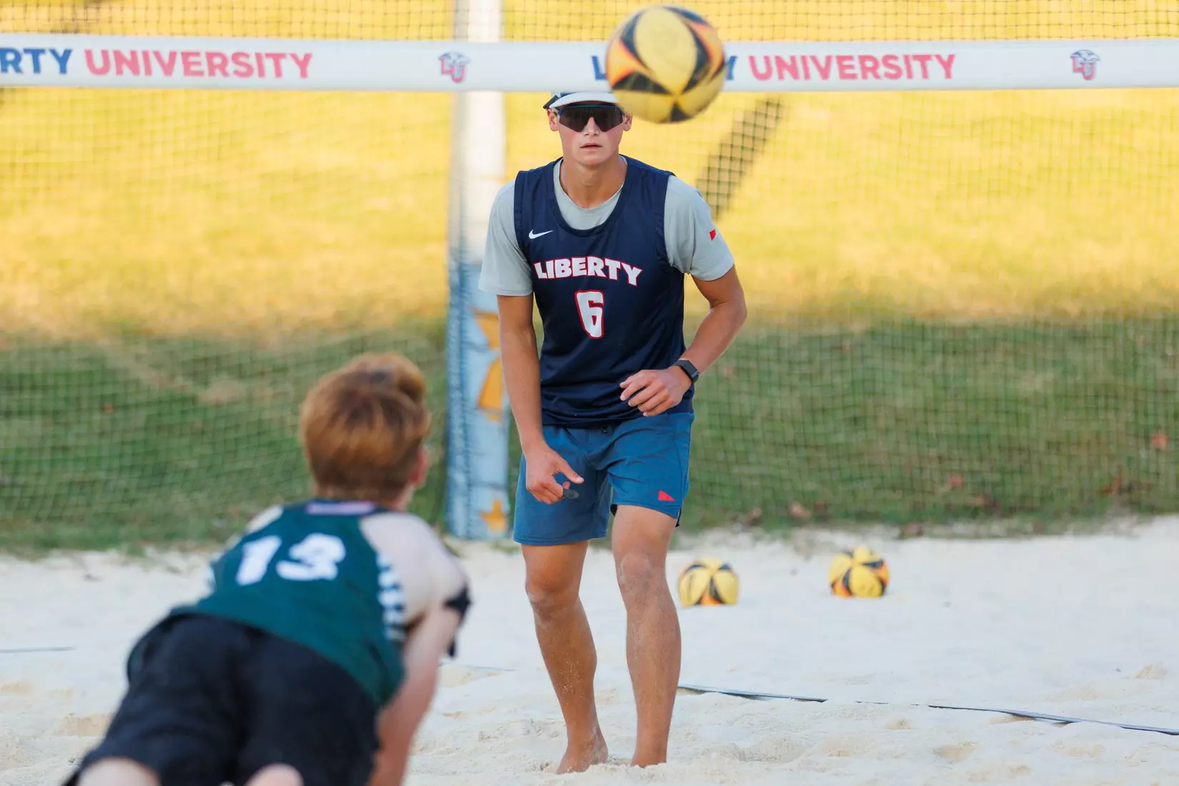 Liberty University’s Men’s Beach Volleyball team faces Stevenson University at the East Campus Beach Courts on October 4, 2025. (Photo by Ryan Anderson)